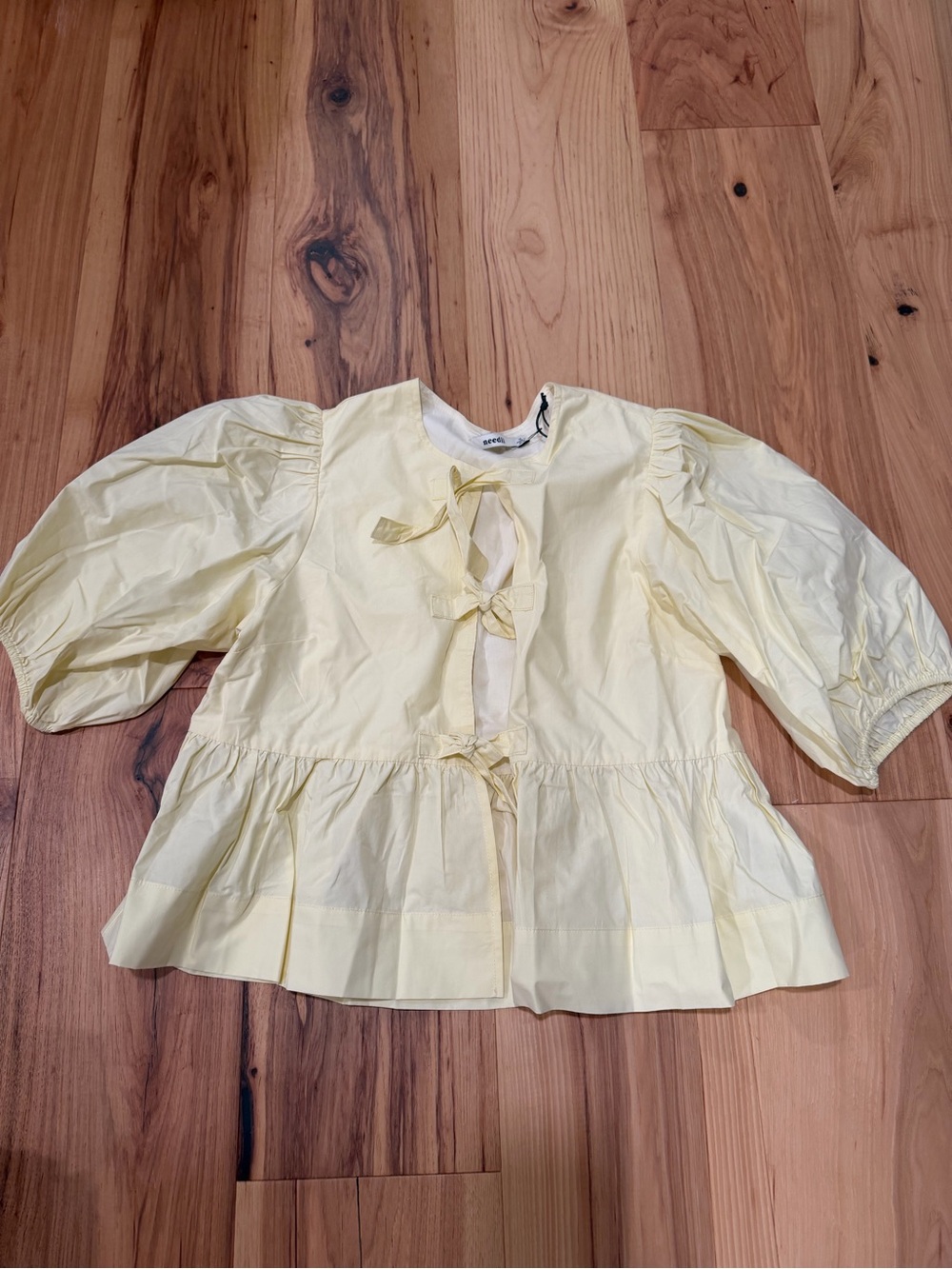 Pale Yellow Tie-Front Peplum Blouse with Puff Sleeves